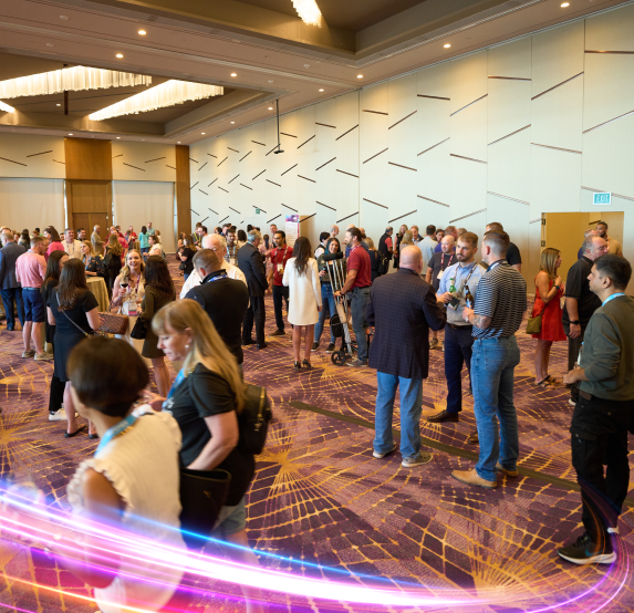 gathering hall full of people conversing